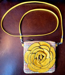 $10. Yellow Leather Flower Purse. Gently used. Not new. No refunds on purses.