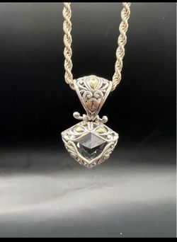 Sterling silver pendant with gold accents with Crystal rock and sterling silver necklace