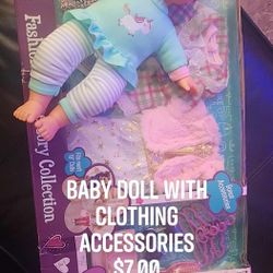 Baby Doll With New Clothing Accessories
