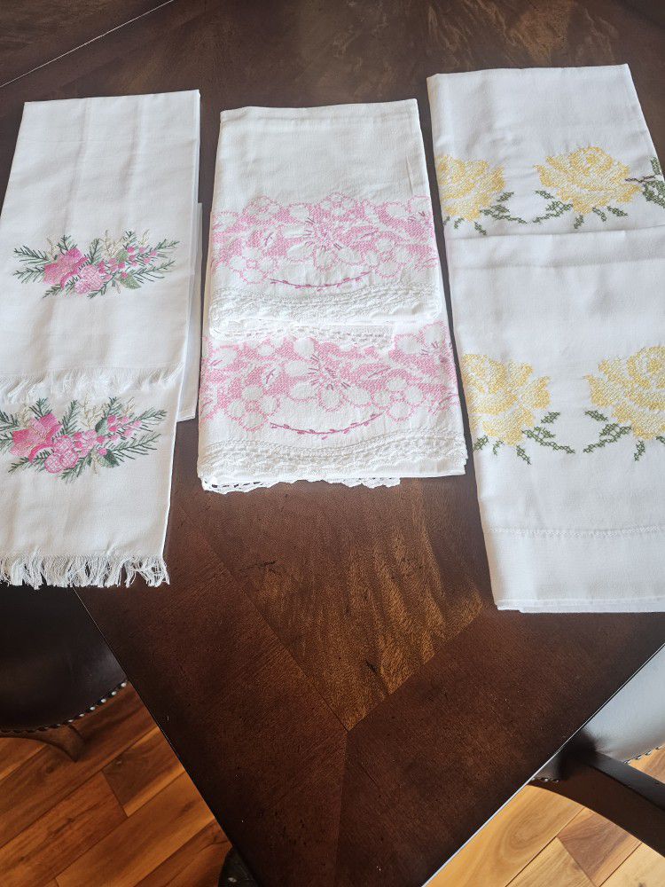 Hand embroidered standard size pillowcases and guess towels