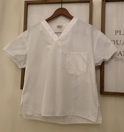 White scrub top
