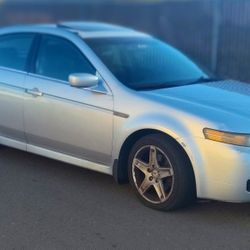 2004 Acura TL  And 2008 Chevy Equinox