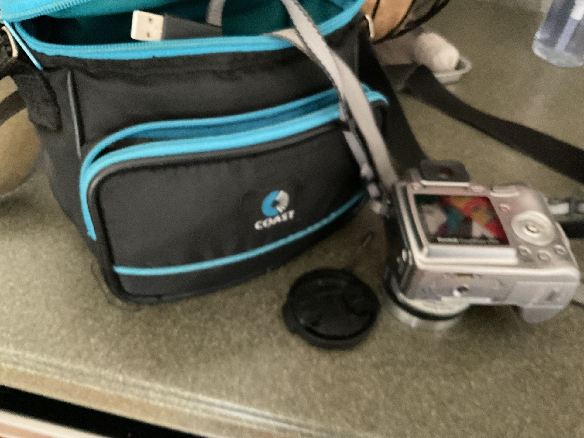 A Kodak Camera, All Glass Lens 38-380 Mm (THE CHARGER CORD IS MISSING)