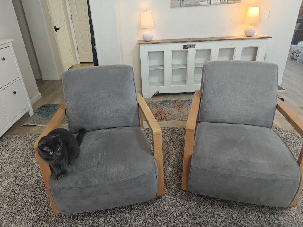 Two grey armchairs