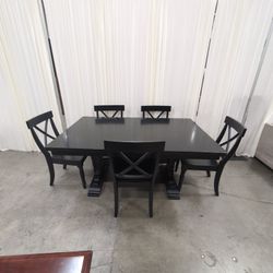Black Wood Trestle Dining Table with Five Chairs