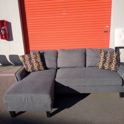 Ashley Sofa w/ Chaise  & Pull Out Sleeper 
