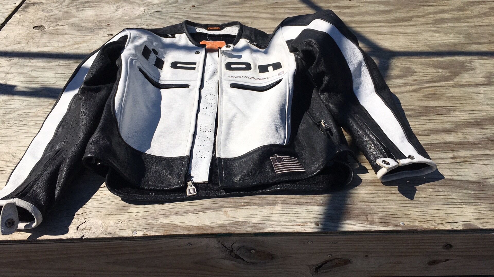 Icon black and white leather motorcycle jacket M