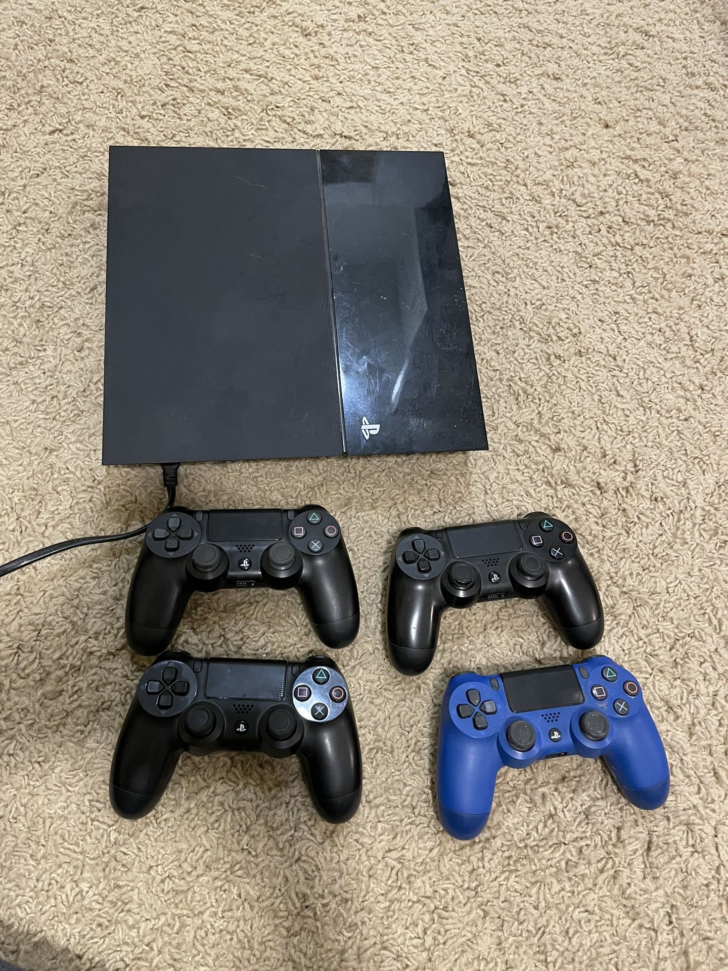 PlayStation 4 (PS4) W/ Games & 4 Controllers