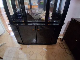 Black china cabinet  well maintained   200 obo