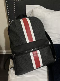 Black and red Micheal kor back pack