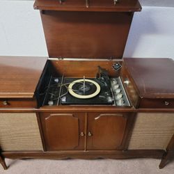 Antique record player radio cabinet