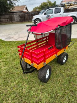 Cartwheels Kids Wagon with Canopy. I will not respond to offers; the price is firm.