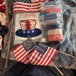 New and Never used!! 
1) Two Rolls of 10 Yards of Crepe Paper Streamers! 
(2)  ALSO.. 12" Art Tissue Uncle Sam Hat Centerpiece!!  
(3)  ALSO... Four U