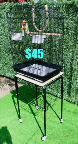 $45 Bird 🦜 Cage 27” in great condition with a rolling stand measuring in pics come with accessories