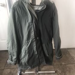 Woman 1x Green Jacket