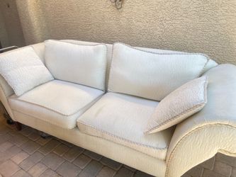 White love seat with 2 chairs.
