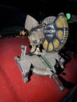 miter saw with sawdust bag