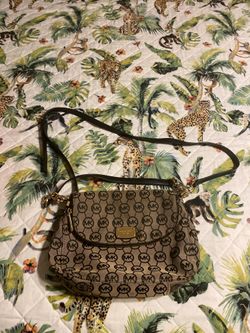 Michael kora cross body bag