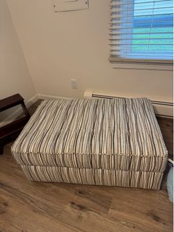 Storage ottoman & pillows