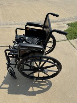 Leather Wheelchair With Durable cushioned Seat And Feet Rest