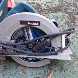Makita electric power rotating saw.