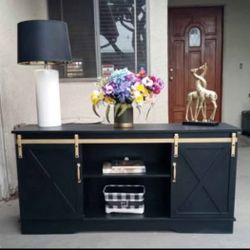 TV Stand With Sliding Farmhouse Doors And Shelves- Black With Gold 