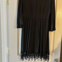 Lovely little black dress size 10 with lace bottom