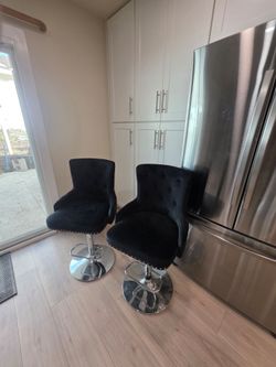 2 Bar stools. Black Faux covered