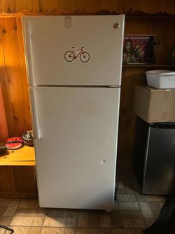 Ge top freezer refrigerator