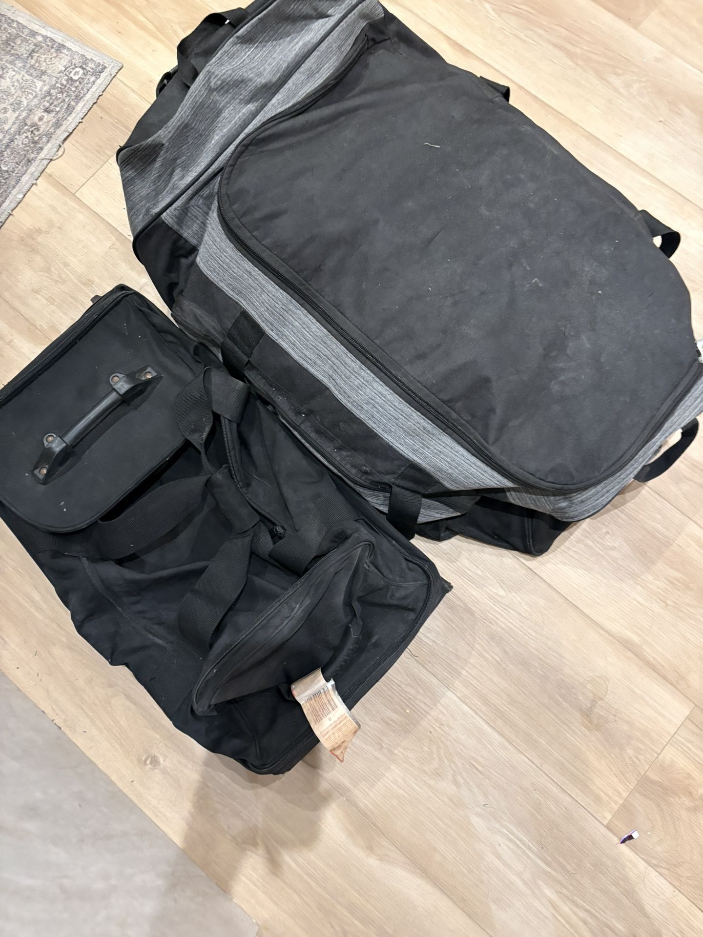 2 Rolling Duffle Bags 