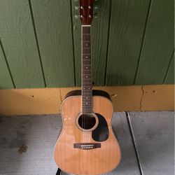 Guitarra Acústica $85.00.obo