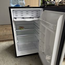 This is a Magic Chef mini refrigerator