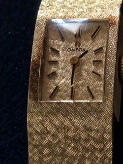 Ladies 14 kt solid gold omega watch