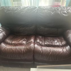 Leather Loveseat Recliners work no torn leather cherry brown color Price Negotiable 