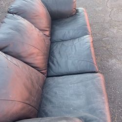 Black Leather Couch  Makes Into Bed