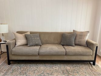 HD Buttercup tan microsuede sofa with wood base