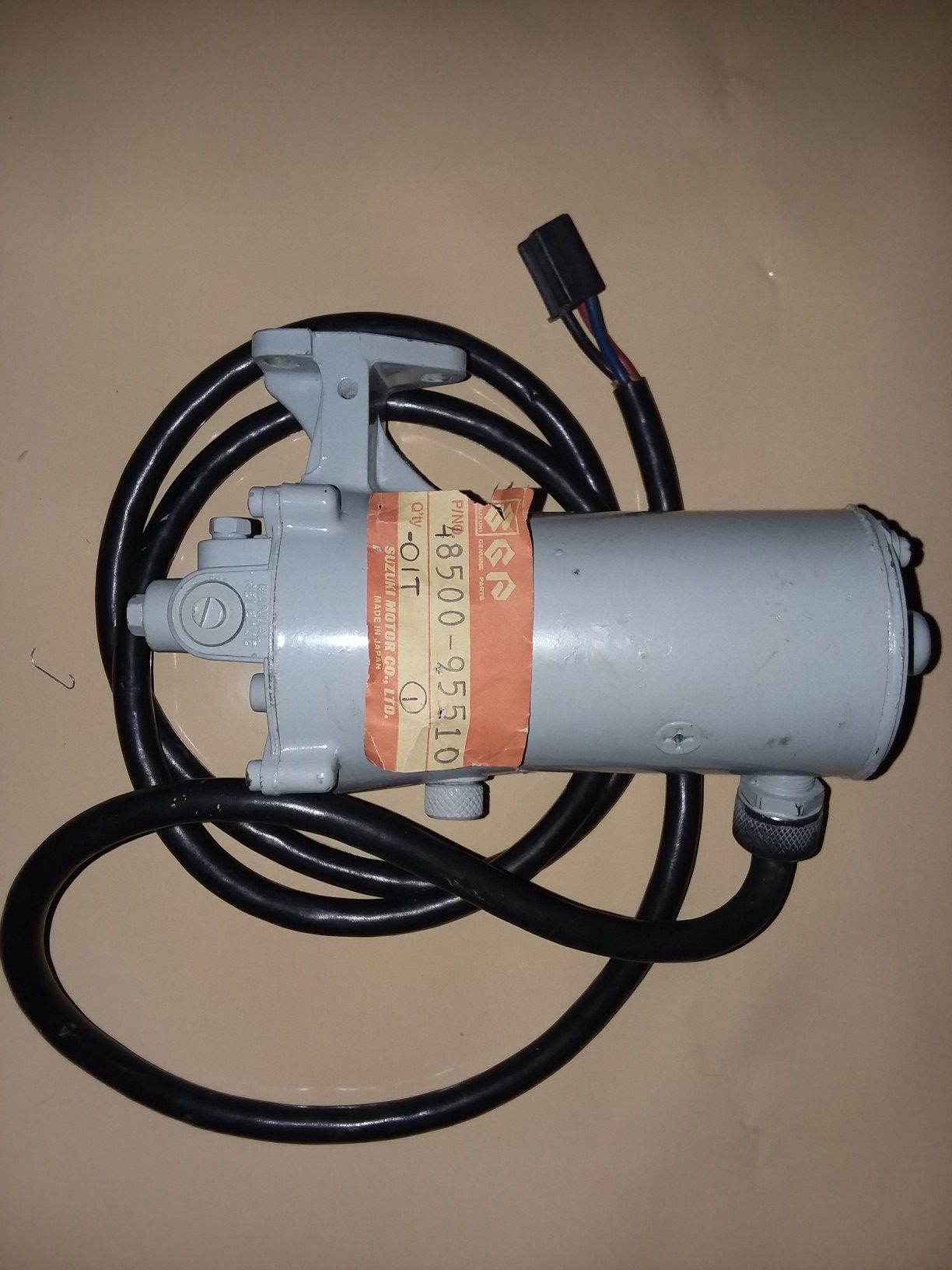 Suzuki power trim power unit assy part number 48(contact info removed)0