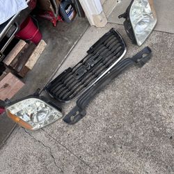 Gmc Yukon Grill & Headlights 