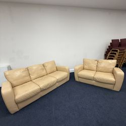 NATUZZI Beige pair Of LEATHER couches