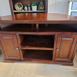 Large wood corner entertainment ceter TV stand