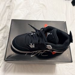 Black Canvas Jordan 4s