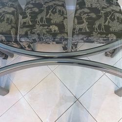 Modern glass top dining table only - chairs sold separately