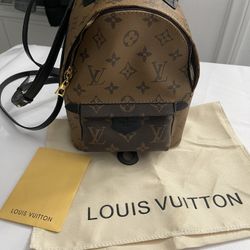 L V SMALL BACKPACK, Used Once