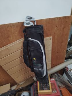 South Bay golf bag an 2 clubs