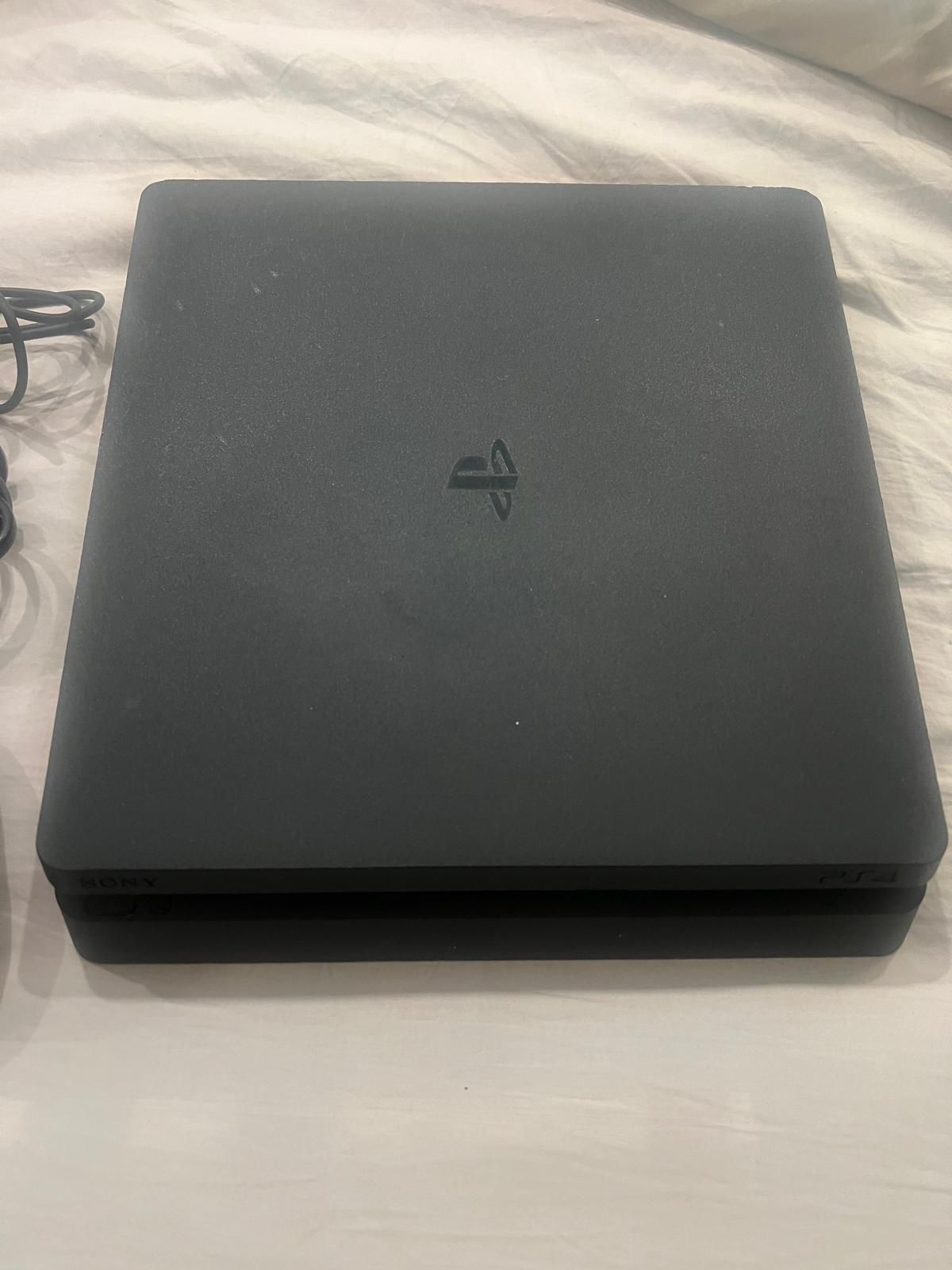 Sony PlayStation PS4 Gaming Console + Remote