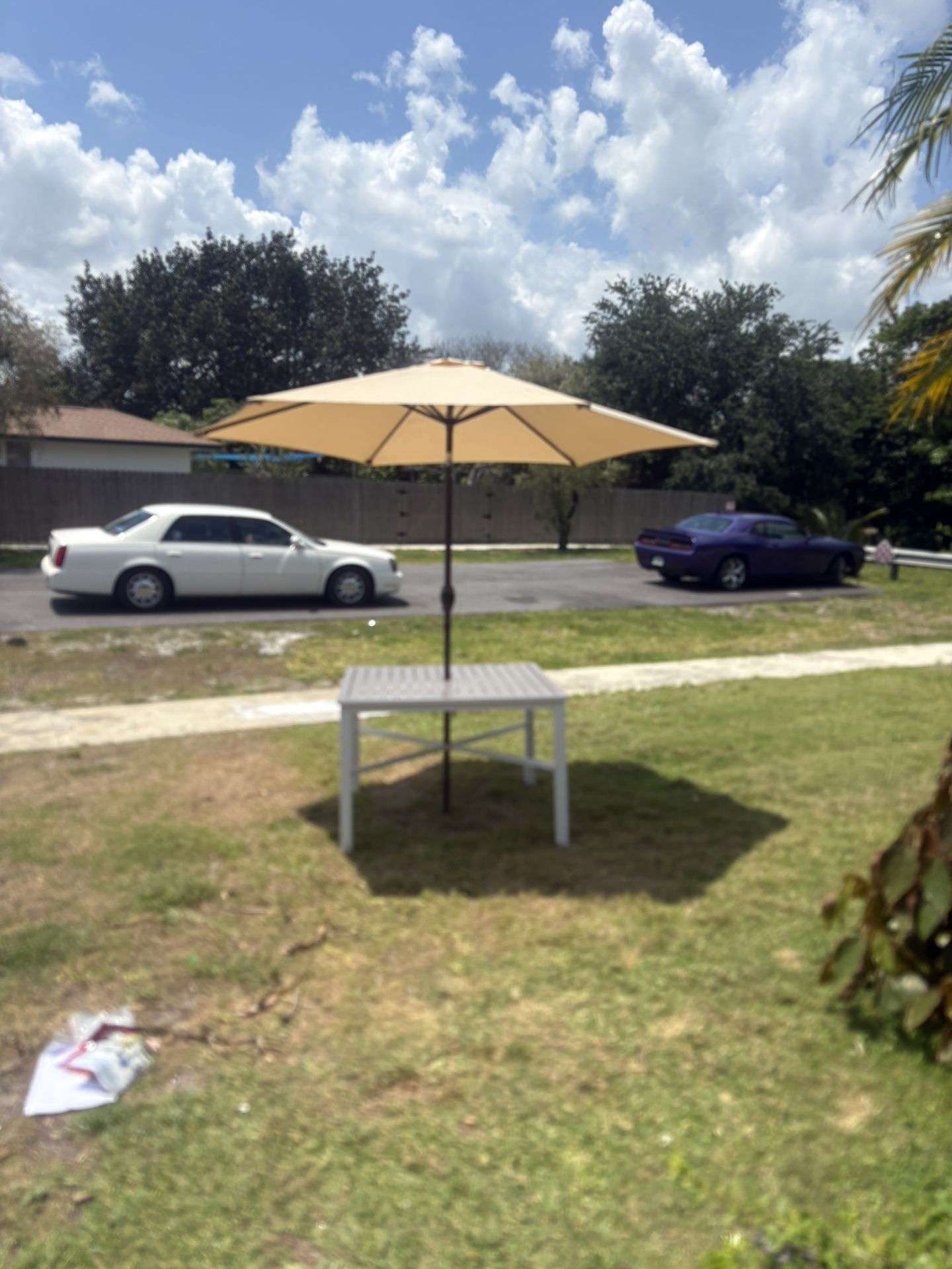 BRAND NEW METAL OUTDOOR TABLE AND UMBRELLA READ DESCRIPTION