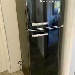 UGC Galanz Retro mini fridge with a top freezer compartment. 