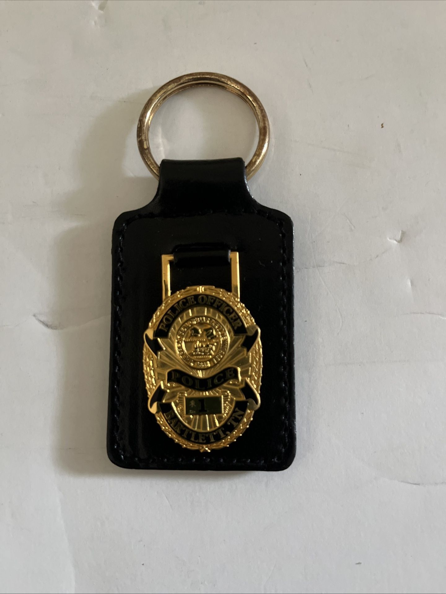 Brand new key chain of Bartlett,TN police office badge