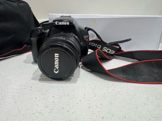 Canon EOS Rebel T3 camera and 2 lens