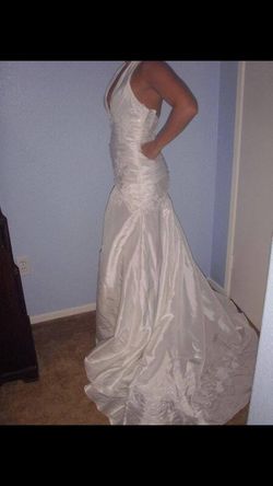 Brand new wedding gown, never worn!